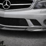 GH Style carbon fiber front bumper add-on lip installed on Mercedes-Benz W204 C63 AMG