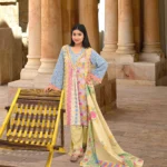 Soft pastel cotton suit featuring delicate floral patterns and comfortable ethnic styling for women.