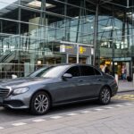 Taxi car at airport terminal 202607230218
