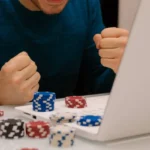 depositphotos 439339216 stock photo gamer man playing his laptop
